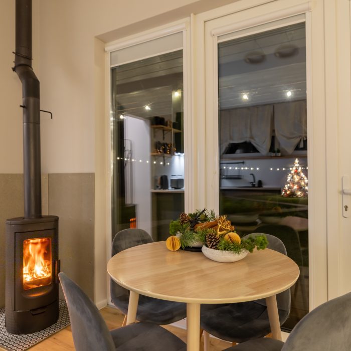 Holiday home Kaija – living room with fireplace